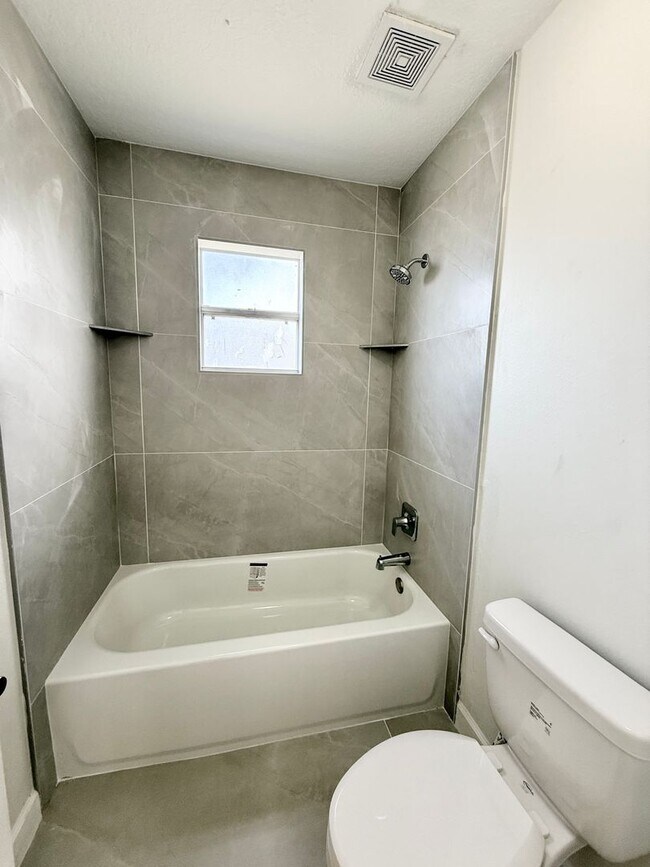 Building Photo - GORGEOUS, Large Completely Renovated Two-Story 4/2.5 PLUS LOFT in POINCIANA VILLAGES!