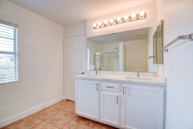 Building Photo - Great home with 4 bedrooms, 2.5 baths. New Floors Paint and Countertops.