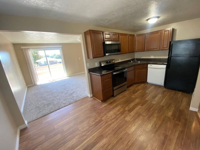 Building Photo - Spacious 2-Bedroom Home in Roy! $350 Off o...