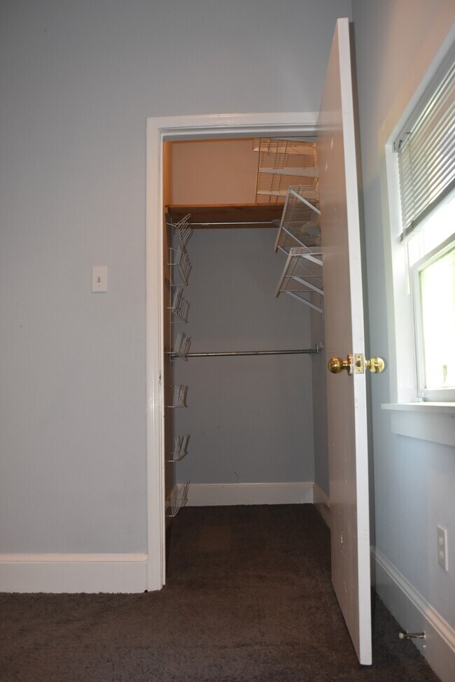 walk-in closet - 2415 Saint Charles Ave