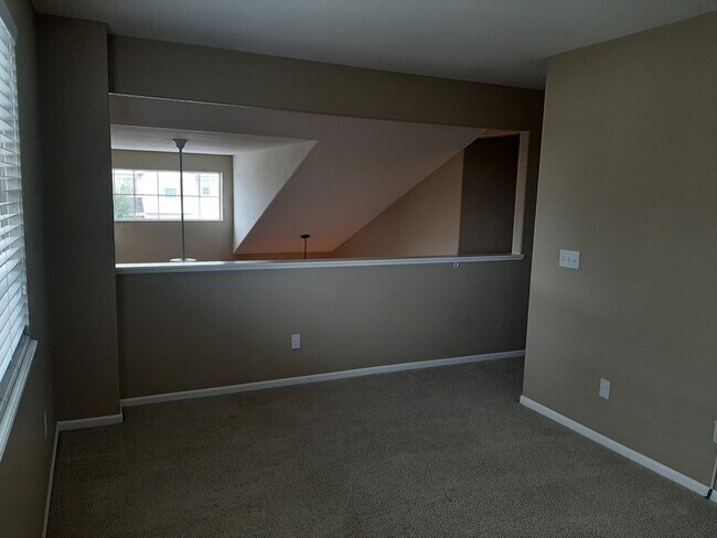 loft overlooks front room - 14219 Woodrock Path