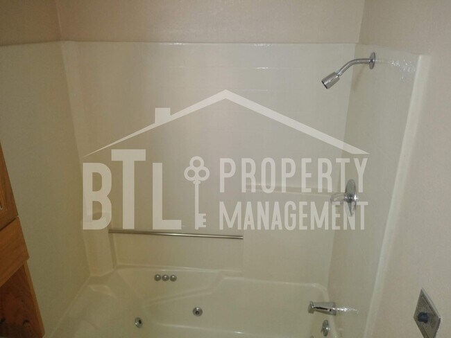Building Photo - Condo by Lake with RV Spot!! 55+ Community