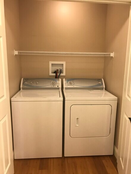 Landry closet with washer/dryer included. - 206 Stallion Way