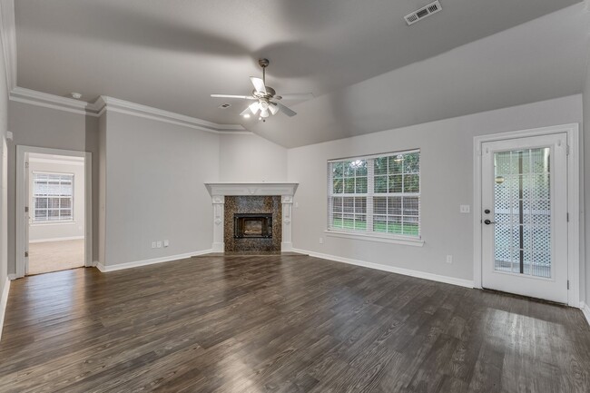 Building Photo - Charming 3-Bedroom Home with Fireplace & A...