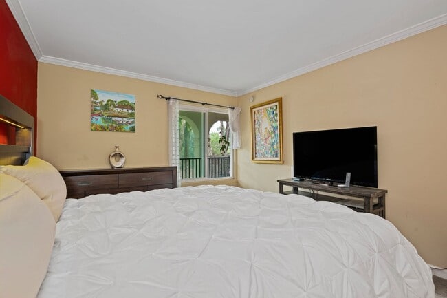 Building Photo - Fully Furnished 1BR/1BA – Top-Floor El Escorial Villa at East Beach