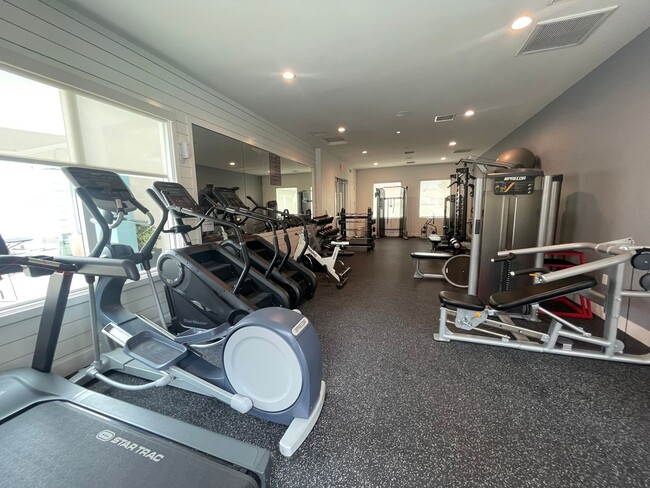 Building Photo - Beautifully upgraded townhome with 2-car i...