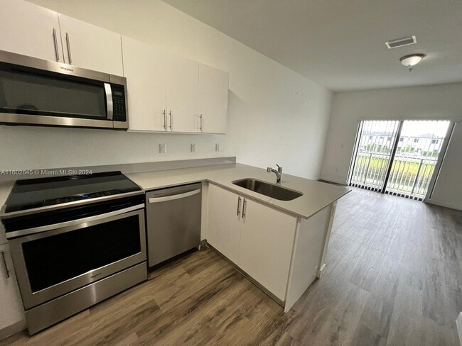 Building Photo - 15650 SW 136th St