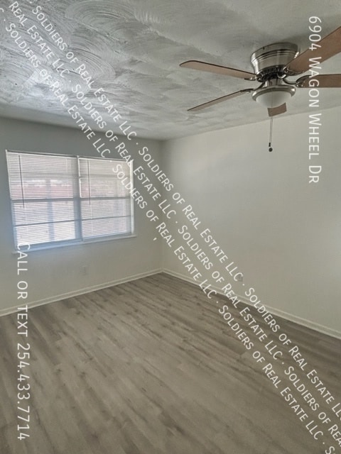 Building Photo - 6904 Wagon Wheel Dr