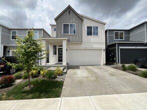Building Photo - Stunning 2024 Built 5BR Home with Main-Level Suite, EV Charger & Covered Patio Near River Terrace