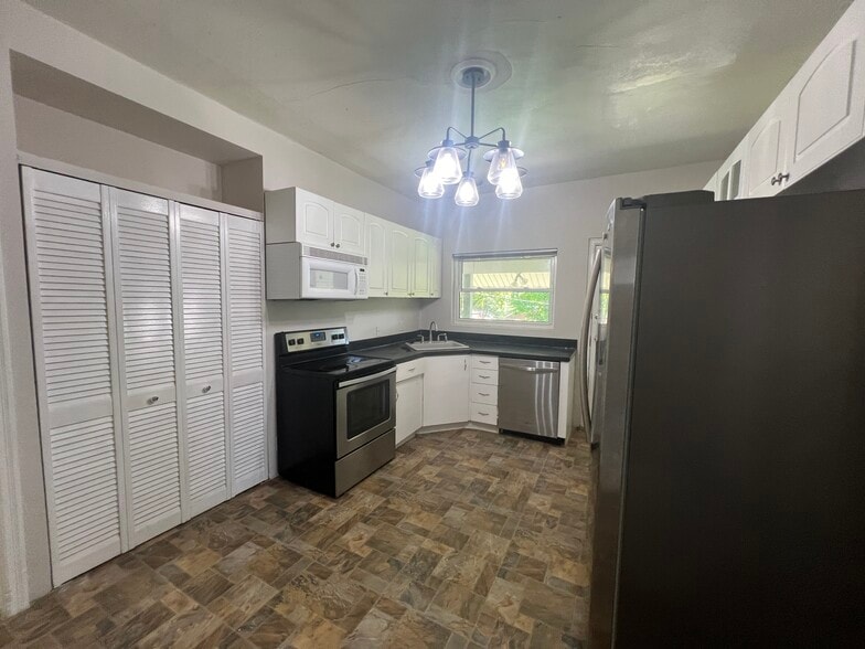 Kitchen with large pantry - 8242 Buchanan Ave