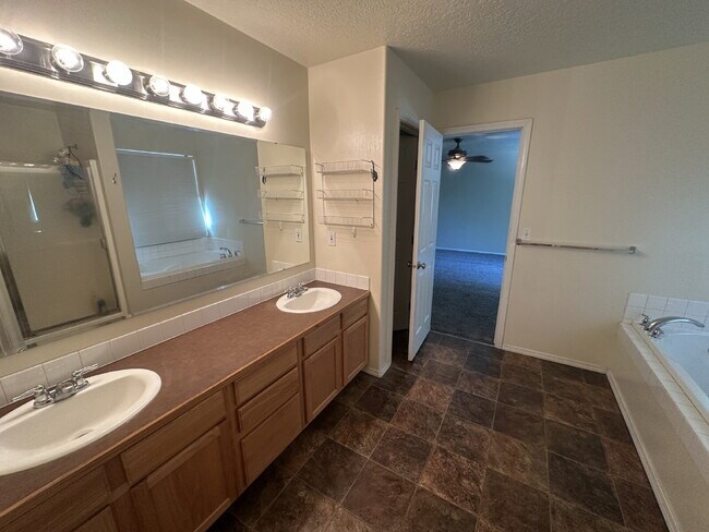 Building Photo - "Spacious 4-Bedroom Gem with 2.5 Bathrooms...