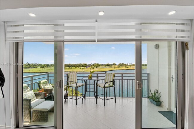 Building Photo - 9250 W Bay Harbor Dr