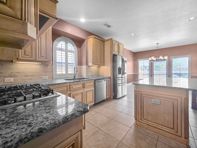 Building Photo - Immaculate 4-Bedroom Home with Luxury Upgr...
