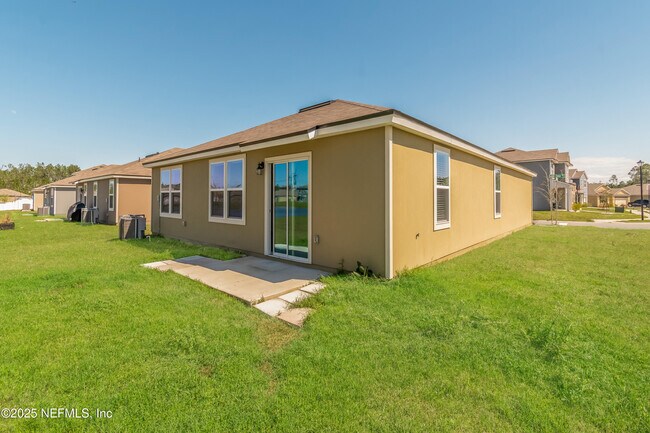 Building Photo - 15697 Saddled Charger Dr