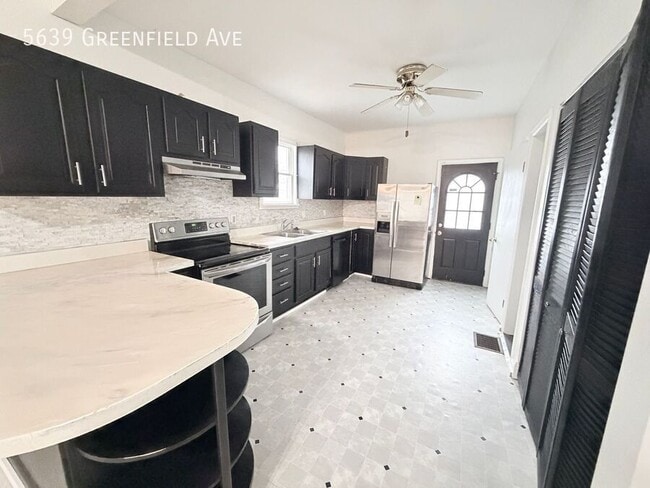 Building Photo - 5639 Greenfield Ave