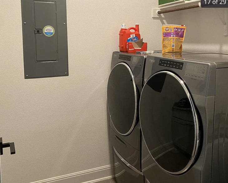 Laundry room with washer/dryer included in rent - 24719 Resort Pky