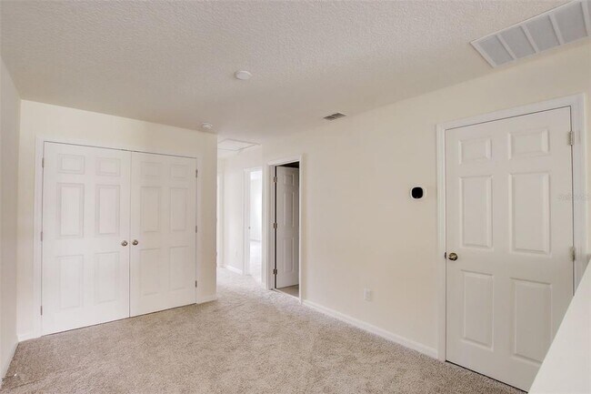 Building Photo - 1688 Tropical Palms Cir