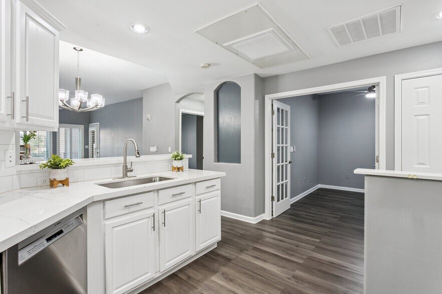 Double door entry to home office opposite from the kitchen - 14000 N 94th St