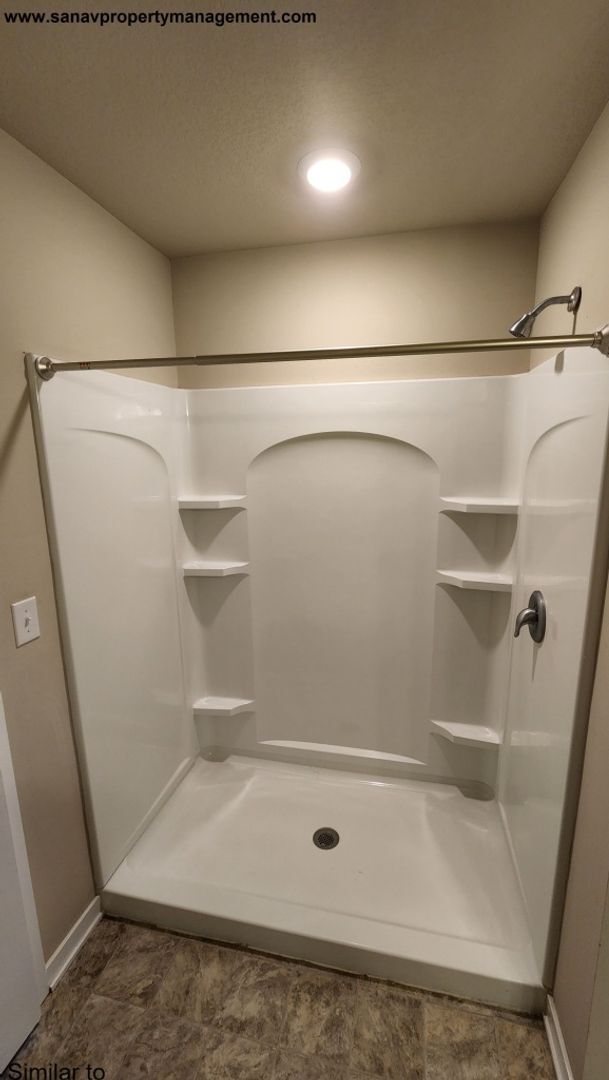 Building Photo - "Modern Luxury: Spacious 4-Bedroom Home with Open-Concept Design"