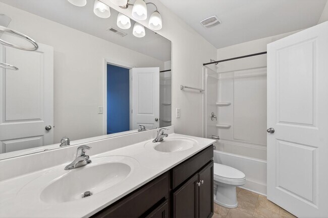 Building Photo - Spacious 4BR Energy-Efficient Home with Loft, Big Yard & Top-Rated Schools!