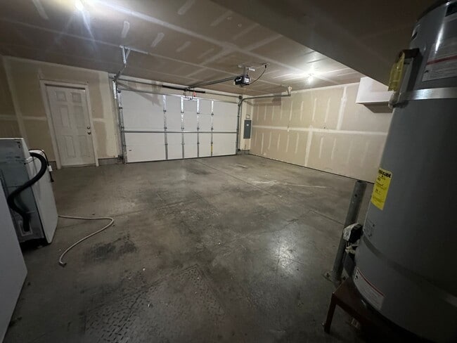 Building Photo - MOVE IN SPECIAL! Spacious 2 bed/2.5 bath with bonus room townhome off Road 68