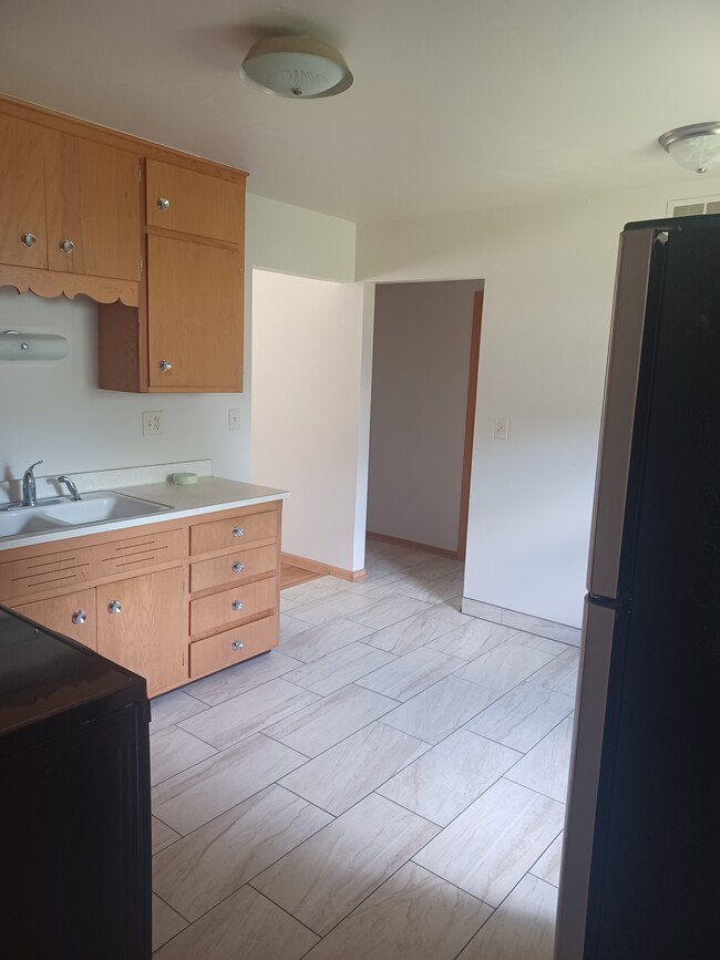 Building Photo - 211 W. Decorah Rd.