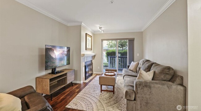 Building Photo - Great location, quiet first floor end unit...