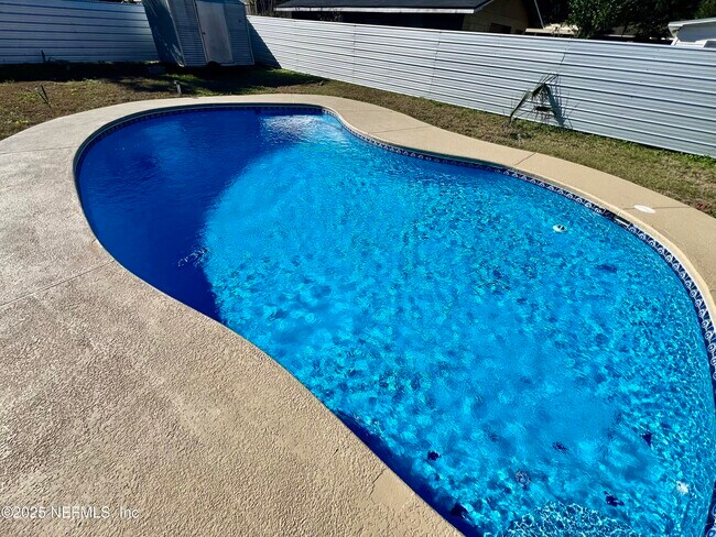 Building Photo - 9720 Jupiter Ct S