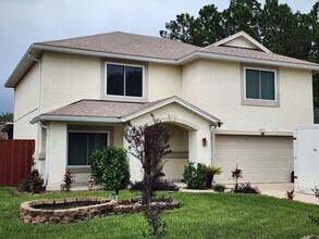 Building Photo - 4 Bedroom 2.5 Bath with in ground pool loc...