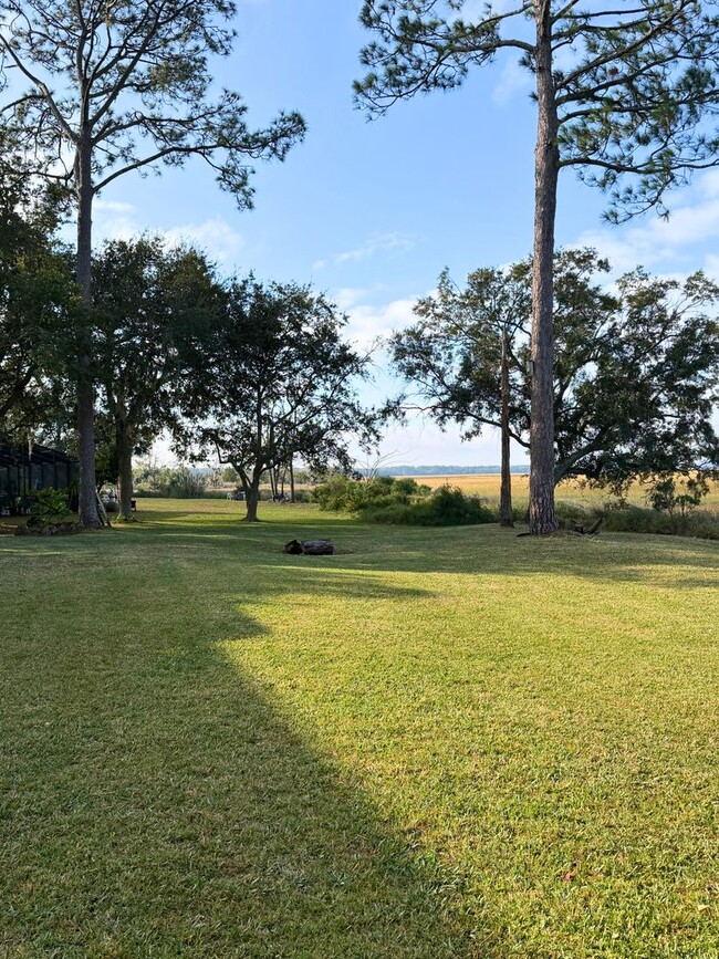 Building Photo - Spacious 4 Bedroom, 2.5 Bath Home with Stunning Marsh Views