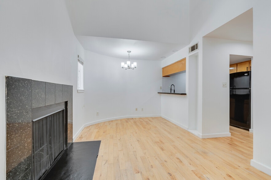 Living Room + Fireplace - 4130 Newton Ave