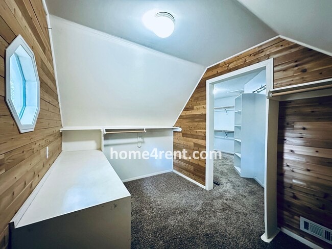 Building Photo - Blue Valley Schools w/ Wood Floors, Finished Basement and a Peaceful, Private Fenced Yard!