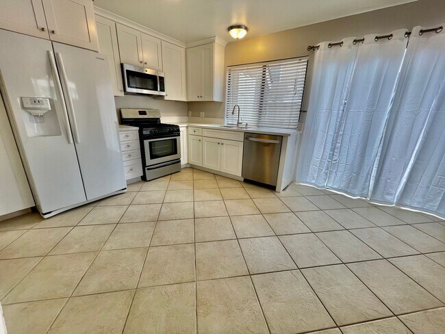Building Photo - Discover the Essence of Irvine Living!
