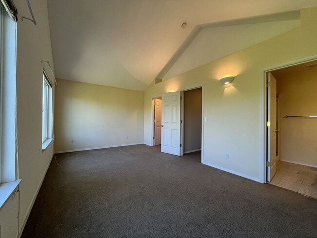 Building Photo - Spacious 3 Bedroom Home with Open Layout, Vaulted Bedrooms & Trail Access