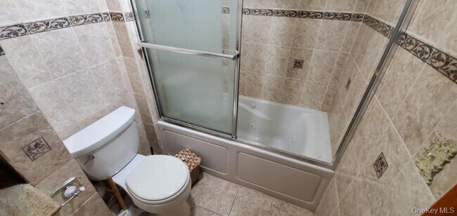 Building Photo - 25-36-36 76th St