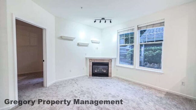 Building Photo - Sunlit & Spacious Ground-Level Condo | 12-Foot Ceilings, Luxury Amenities & Ideal Locale