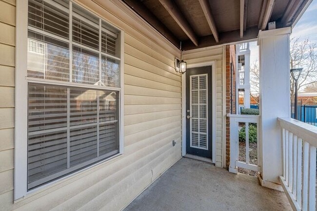 Building Photo - Spacious 2-Bedroom Elite Apartment with Private Balconies & Washer/Dryer