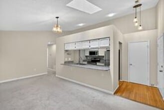 Building Photo - Spacious and Sunlit 2BR/2BA Condo with Por...
