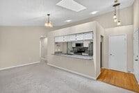 Building Photo - Spacious and Sunlit 2BR/2BA Condo with Por...