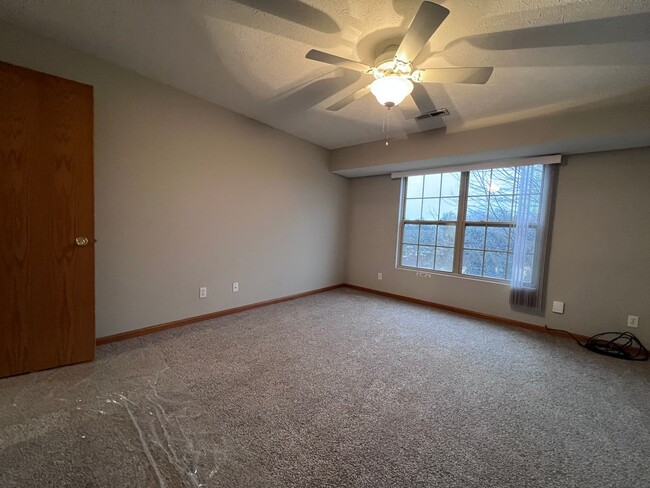 Building Photo - End Unit Two Bed Two Bath Second Floor Con...