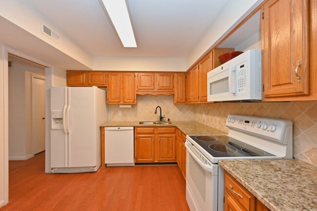 Building Photo - Tucked away in a quiet community with only one entrance and no through-traffic.