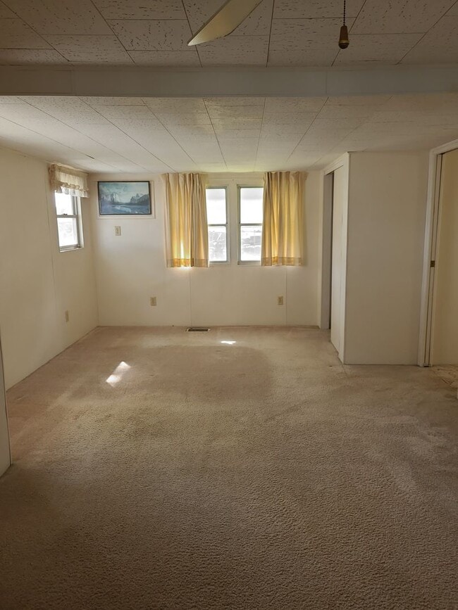 Building Photo - 55+ mobile home community. On canal to bea...