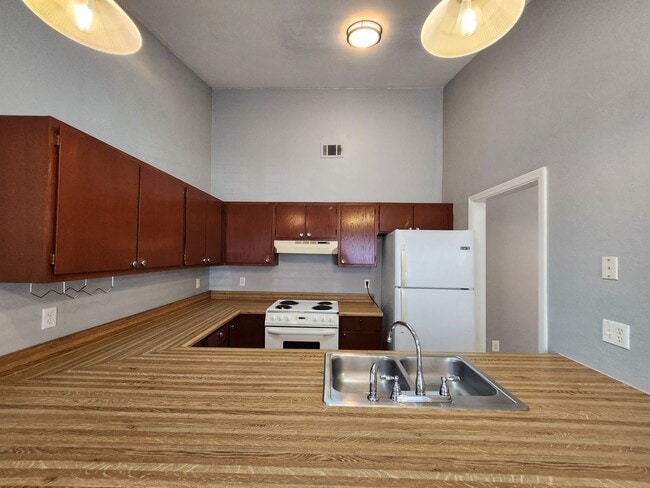 Building Photo - Remodeled 2 bedroom duplex with all wood floors for rent May 6, 2026 for $1350 per month