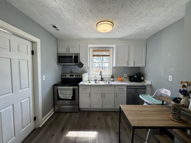 Building Photo - Welcome to this charming Cape Cod style ho...
