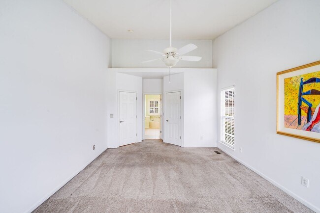 Building Photo - Enjoy Riverfront Living! Spacious 4-Bedroo...