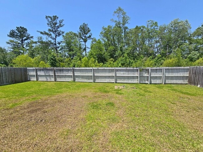 Building Photo - Stylish 4-Bedroom Home with Screened Porch...