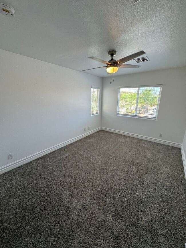 Building Photo - STUNNING 2 STORY HOME IN A GUARD GATED COM...