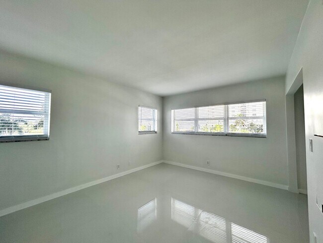 Building Photo - Fully Renovated East-Facing 2BR/2BA + Bonus Room | Ocean Views | In-Unit W/D