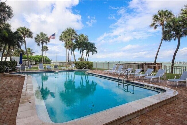 Building Photo - TURNKEY FURNISHED WATERFRONT RENTAL – Live the Island Life on Siesta Key