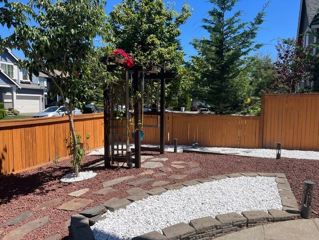 Building Photo - Spacious 4 Bedroom Home with Zen Backyard and 3-Car Garage
